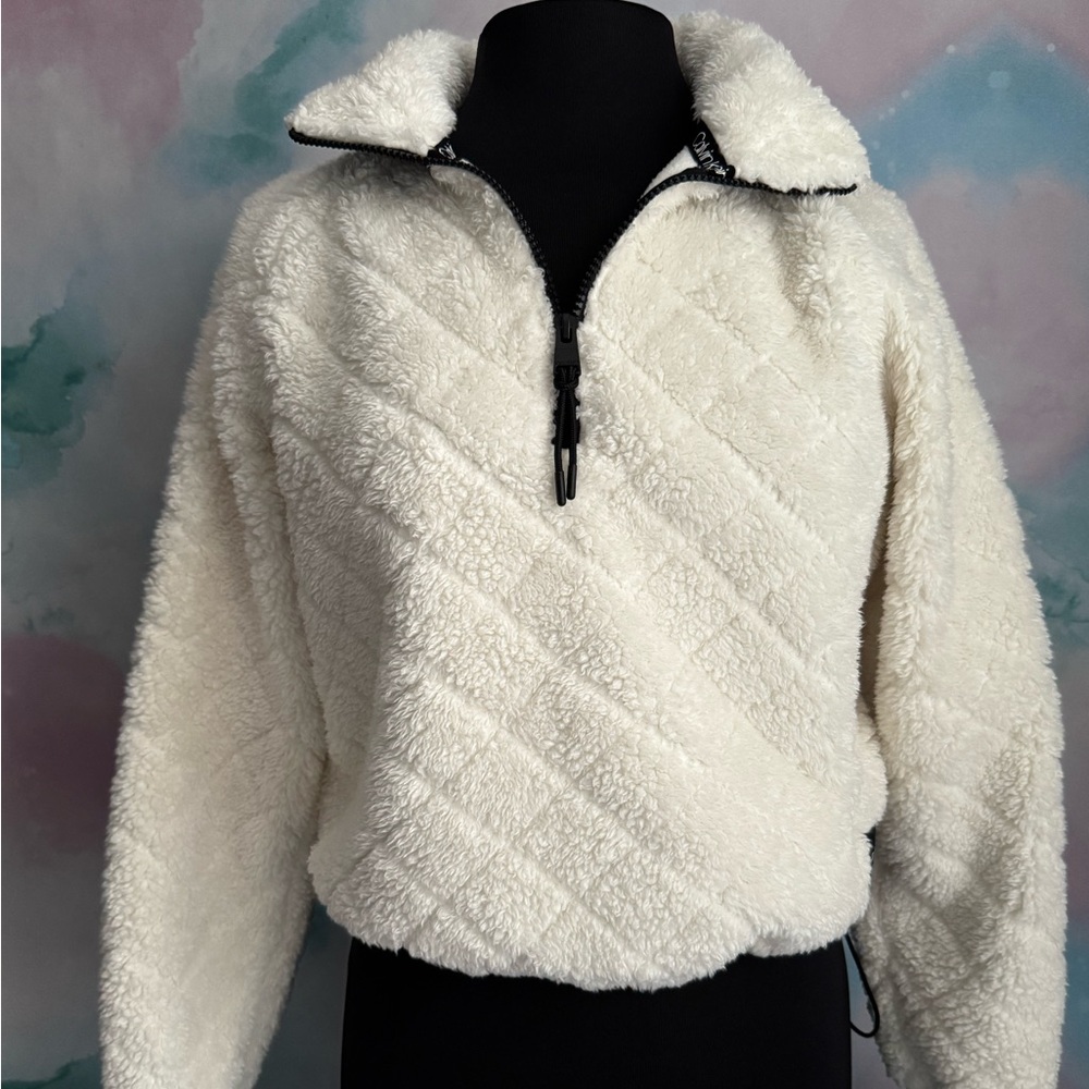 Calvin Klein Performance fleece crop half zip in winter white with black trim.